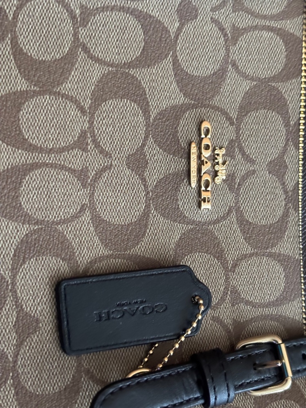 Coach handbag/tote, large and roomy in brown with black straps